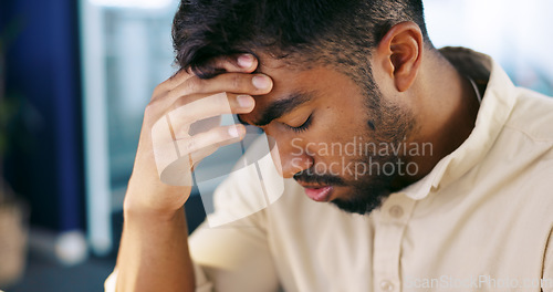 Image of Stress, headache and tired businessman in the office with a burnout working on a project with a deadline. Exhausted, fatigue and overworked professional male employee planning report with frustration