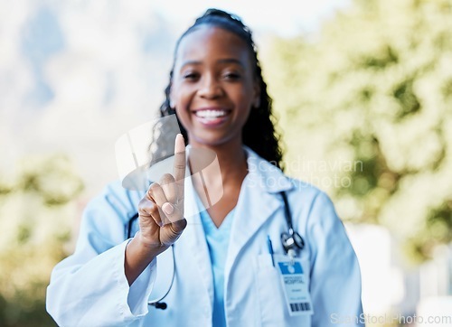 Image of Black woman, doctor and hand for healthcare, health insurance and medical care for wellness. Finger or a medical professional as expert in medicine and healing with pride for development and advice