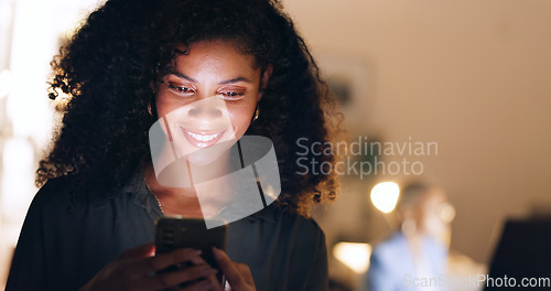 Image of Social media, phone and happy woman typing on a dating app or website for a love connection and romance. Smile, relaxed and young woman texting, chatting and online dating in a dark night at home