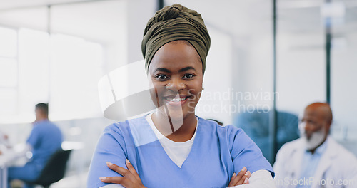 Image of Black woman, healthcare and hospital nurse with arms crossed of medical service, management or surgery. Portrait, smile or happy doctor, surgeon or therapist consulting in clinic, trust or motivation