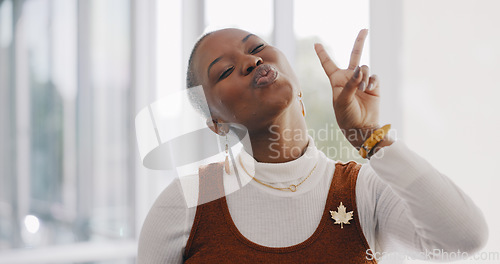 Image of Black woman, peace hand and kiss face for corporate happiness, creative employee motivation and designer success. African business woman, smile and happy hands emoji or positive mindset energy