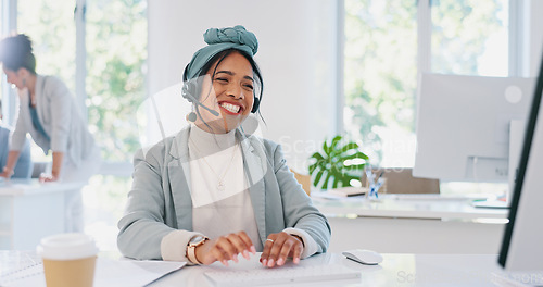 Image of Customer support, crm or woman in call center telemarketing, typing or helping client with loan advice at computer desk. Customer services, technical support or worker speaking or talking for sales