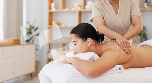 Image of Massage, luxury spa therapy and woman at wellness center for stress, pain relief and to relax body. Calm, peace person and organic zen physiotherapy healthcare treatment at expensive lifestyle resort