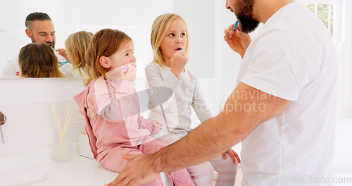 Image of Brushing teeth, family and bathroom by children learning, cleaning and grooming with father in morning. Happy family, teaching and kids with parent brushing, oral and mouth health, teeth and hygiene