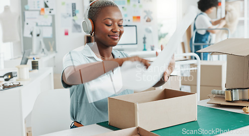 Image of Startup, shop and entrepreneur packing a box for an order of products for shipment or delivery. Black business owner preparing a retail package for courier with her corporate partner in their office.