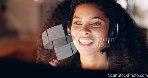 Image of Happy, call center and black woman working in customer support in office at night, friendly and helpful. Crm, telemarketing and consulting by woman agent offering online support and customer service