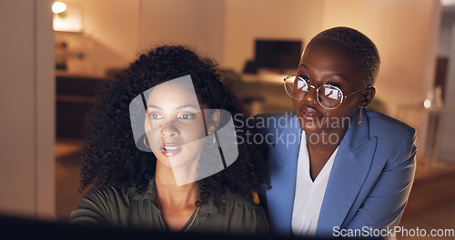 Image of Manager, feedback and woman on computer working on corporate project with leader in the office. Explaining, leadership and black women in collaboration talking and analyzing online business documents