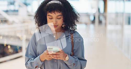 Image of Phone, smile and black woman in a shopping mall reading social media, web and mobile internet text. Happy online communication, online shopping and mobile phone webpage sale of a woman on a app