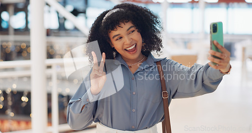 Image of Black woman influencer, selfie and peace sign with smile, smartphone or walking in urban shopping mall. Happy, phone and woman with hand gesture for social media, web or online app at mall in Atlanta