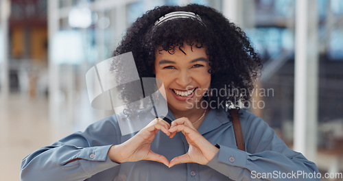 Image of Business woman, face or heart sign in modern office, marketing customer support or client branding care. Portrait, happy smile or love hands gesture for creative designer, Brazil worker and employee