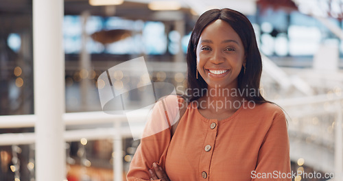 Image of Black woman, happy with face and success in business, employee at modern office in Cape Town and positive mindset. Professional portrait, African and workplace mockup with laughing and work happiness