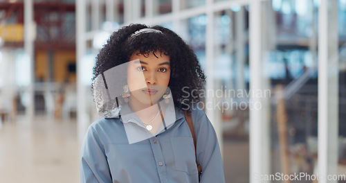 Image of Creative black woman, face and arms crossed for vision, career ambition or empowerment at the office. Portrait of African American woman employee designer with crossed arms in confidence for startup