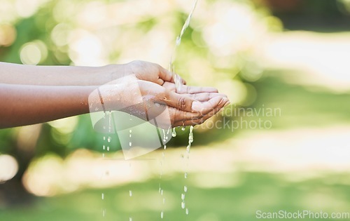 Image of Outdoor, hands and water for cleaning, hydration and hygiene for care, splash and wellness. Nature, hand and aqua for washing, prevent germs and remove dirt for freshness, environment and outside