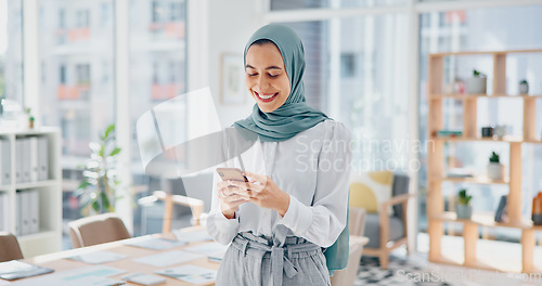 Image of Creative muslim woman, phone and face smile for social media, communication or texting in startup at the office. Portrait of happy islamic woman smiling for online conversation on mobile smartphone