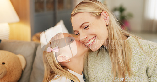 Image of Love, mom and daughter kiss in home with cute smile for care, appreciation and gratitude. Mama, happy and family with sweet and adorable affection from young child in Canada living room.