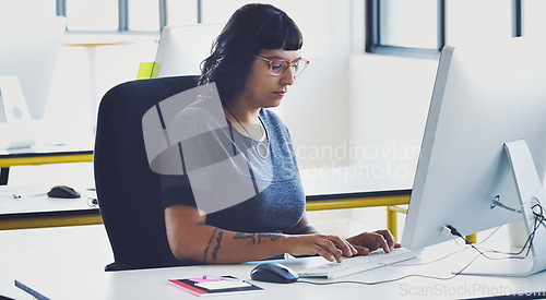 Image of Computer, startup or focus woman in office typing for cybersecurity, app coding or networking. Research, desk or employee working on tech for software code, programming or SEO website server review