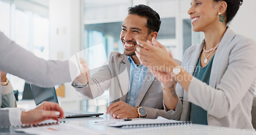 Image of Applause, meeting and business people shaking hands in partnership, welcome or onboarding in an office. Handshake, collaboration and corporate team in celebration of teamwork success in the workplace