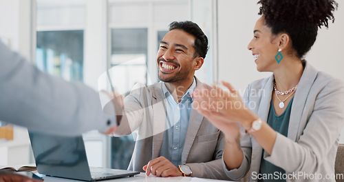 Image of Applause, meeting and business people shaking hands in partnership, welcome or onboarding in an office. Handshake, collaboration and corporate team in celebration of teamwork success in the workplace