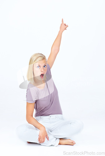 Image of Surprised, shocked and portrait of a woman pointing isolated on a white background in studio. Wow, wtf and amazed face of a girl with a hand gesture for disbelief, alert and showing on a backdrop