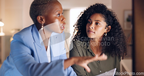 Image of Feedback, black woman and manager coaching, explaining or training at startup business desk. Women planning, instructions and corporate leadership at marketing or advertising company with girl boss.