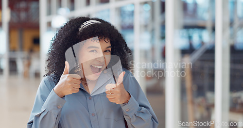 Image of Black woman, face and smile with thumbs up for good job, okay or satisfaction for career at the office. Portrait of happy African American female creative designer smiling with thumbsup for startup