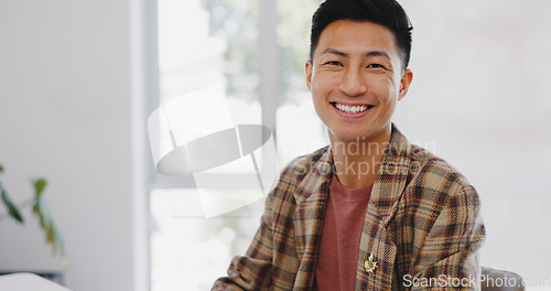 Image of Web design, smile and face of an Asian man on a computer for information technology, website and coding. Happy, designer and portrait of a programmer working on a desktop app on a pc for work