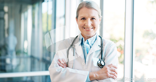 Image of Woman, face or arms crossed doctor with hospital surgery ideas, life insurance vision or medical wellness goals. Mature portrait, smile or happy healthcare worker in trust innovation or success help
