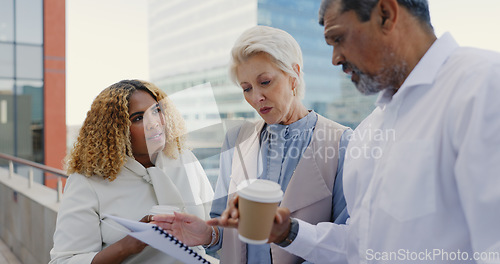 Image of Leadership, senior or business people networking on rooftop in city talking or planning a digital marketing strategy. Teamwork, CEO or employees in meeting speaking of kpi goals or sales growth ideas