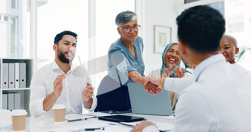 Image of B2B, thank you and handshake business people applause for welcome, partnership or hiring contract on success deal. Trust, support and collaboration worker shaking hands at end of business meeting.