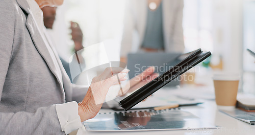 Image of Hands, tablet and senior woman in meeting researching, internet browsing or networking. Technology, planning or elderly female employee typing on touchscreen with business people in company workplace