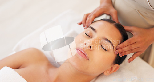 Image of Spa, head massage and calm woman enjoying a relaxing treatment in a wellness, health and beauty center. Relax, peace and therapist doing relaxation therapy for a girl at a luxury natural salon.