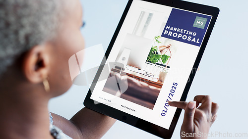 Image of Marketing, advertising and tablet with a business woman or graphic designer working on a presentation. Creative, design and proposal with a female employee at work online in her office on a website