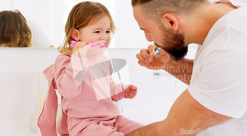 Image of Father and child brushing their teeth with toothbrush together in bathroom of their home. Happy, dental care and man teaching his girl kid oral hygiene routine with toothpaste for health and wellness