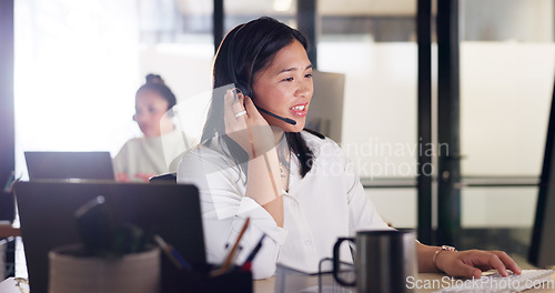 Image of Call center, customer service and Asian woman consultant in the office doing a consultation online. Contact us, ecommerce sales professional and female telemarketing agent working on a crm