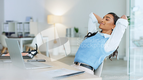 Image of Business woman relaxing after finally finishing a deadline and working on a laptop alone at work. Pleased black female corporate professional done with a project and sending emails