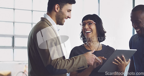 Image of Digital tablet, office and team working on a corporate project together while in discussion. Technology, planning and group of business people doing research for a company report with a mobile device