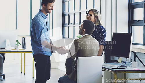 Image of Handshake, meeting and leadership with businesspeople in office for b2b, collaboration or teamwork. Support, happy and deal with employee shaking hands in digital agency for creative, vision or goals