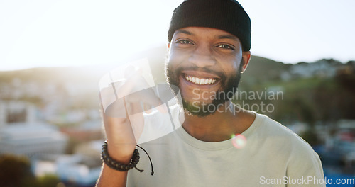 Image of Black man, portrait and call me hand in city outdoors on holiday, vacation or trip. Face, smile and male from South Africa with calling hands gesture, comic and smiling, laughing and happy with life.