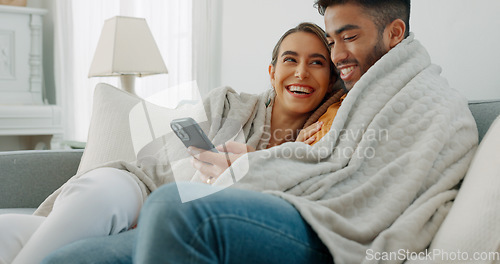 Image of Happy, couple with phone for communication, networking or social media app at home. Movie, video or love man and woman relax in living room streaming online, internet or website with smile in house