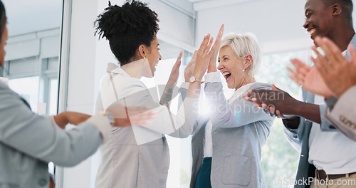 Image of High five, team and support with business people and success, celebrate winning and solidarity with teamwork. Diversity, celebration and collaboration with happy employee group, applause and winner.