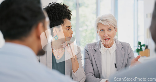 Image of Teamwork, documents and women in business meeting for planning, strategy and marketing report. Collaboration, management and professional workers in discussion with paperwork, review and proposal