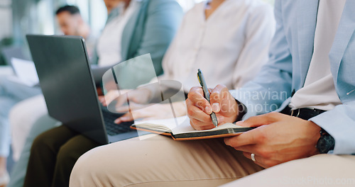 Image of Recruitment, row and business people writing in notebook for hiring, job interview or work opportunity. Human resources, onboarding and candidates sitting with book, typing on laptop and write notes