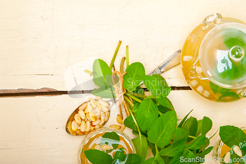 Image of Arab traditional mint and pine nuts tea