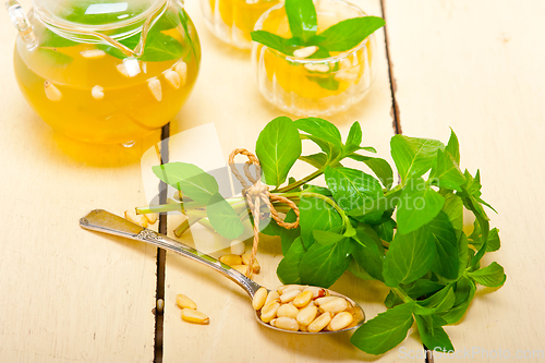 Image of Arab traditional mint and pine nuts tea