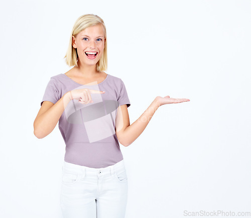 Image of Announcement, portrait or woman with mockup for marketing, branding or advertising space on studio background. Discount deal, product placement or happy girls hands showing sales offer in promotion