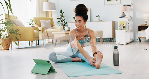 Image of Fitness, yoga or meditation stretching woman for workout in the living room of her house. Girl with chakra focus, mindset or balance while training, exercise or health with zen pilates for wellness.