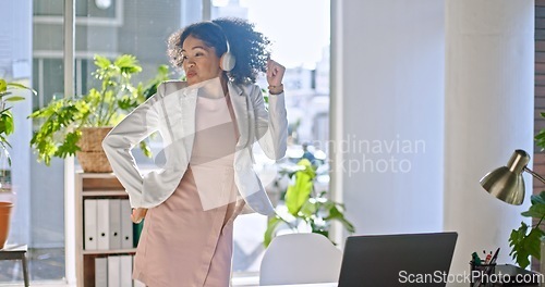 Image of Business laptop, dance and black woman in office celebrating successful project. Energy, freedom and happy carefree female employee from South Africa dancing for victory after winning contract deal.