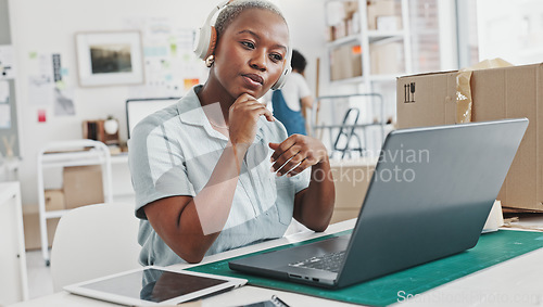 Image of Small business owner, woman and laptop video call to customer, clients and virtual communication webcam in startup. Black female entrepreneur talking ecommerce service, online logistics and meeting