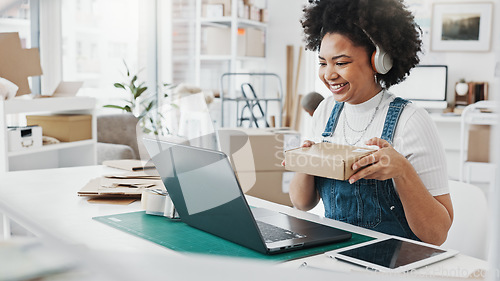 Image of Ecommerce worker and laptop music with headphones for organisation concentration in office. Logistics, planning and communication woman for delivery schedule online with cargo distribution.