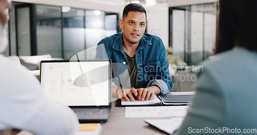 Image of Businessman, negotiation talk and meeting in office with group, laptop or documents for contract. Man, business discussion or communication with human resources team for deal at modern office at desk